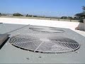 i had a few people ask me about discharging the run capacitors on hvac equipment. i finally got a few clips saved up so i could make a demo of that.

first things first, i do not manually discharge the run capacitors on hvac equipment. the reason being... you don't have to! if the system has been operating normally, once you disconnect line power, the run capacitor(s) will be discharged in a matter of seconds through the motor windings still attached to it. 

the only way to even leave voltage applied to a run capacitor is to disconnect a wire from it while it was running.

in the video i demonstrate that there is no voltage across the terminals within seconds of shutting off the main power. then i do a demonstration by disconnecting the brown wire to the fan motor while it is running to leave voltage in the run cap. then shut down the main power and short the run capacitor with a screwdriver. 
it creates a few sparks :)
note that the sound of the arch was so loud, that it caused the camera mic gain to be reduced for a few seconds before it increased enough again to pick up the surrounding noises. 


the units used in the video are 3 phase 460 volts. the condenser fan motors are the only single phase motor in the unit therefore the only run capacitors as well. the compressors and blower motor are 3 phase.