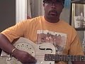 rev. km williams playing a revised  blind willie johnson style song on his republic steel resonator (rg03) in his bathroom