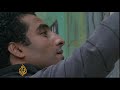 Artists use graffiti to tell Egypt revolution