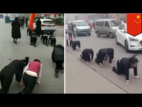 Chinese staff misses sales goals, forced to crawl on street - TomoNews