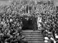 This is actual film footage in it's entirety of G.K. Chesterton being made an honorary Holy Cross Crusader by Worcester College. I'm sorry for the poor quality, but I had to purchase this footage from the archives of an English film company, and I couldn't afford the high quality version (more than $500). I have some stills of the higher quality version however, and have interjected a couple of them into the film where there were missing frames.G.K. Chesterton was an author and journalist during the early part of the 20th century. He is best known for his 