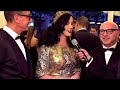 dressed from crown to toe and flanked by designers domenico dolce and stefano gabbana, pop queen katy perry explains how she channeled the original punk, joa...