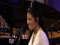 Tibetan-born singer Yungchen Lhamo gets the audience involved by asking them to lay down a vocal drone over which she improvises a melody for peace and understanding.