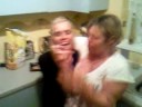wife & mum force feeding each other  a sandwitch lol