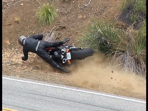 R1 - Rider on a Crossplane R1 catches foot peg causing rider to exit the roadway. Rider was uninjured.