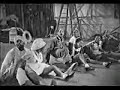from hellzapoppin' (1941), the hilarious hollywood production directed by h.c. pootter and starring zany commdians ole olsen and chic johnson, this clip features rex stewart (co), jap jones (tb), elemer fane (cl), unknown (ts), slim galliard (p,g,tap-dancing), slam stewart (b), cee pee johnson (d), the harlem congaroos (dancers, aka whitey's lindyhoppers).

http://www.savoystyle.com/hellzapoppin.html

