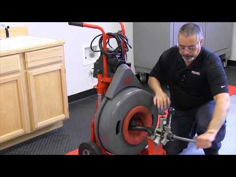 How to remove and reinstall the power feed on the RIDGID K7500 drum machine