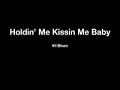 Holdin me kissin me baby