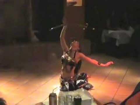 Melina of Daughters of Rhea's Belly Dance Sword  Dagger Act