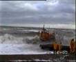 RNLI lifeboat launch in rough sea