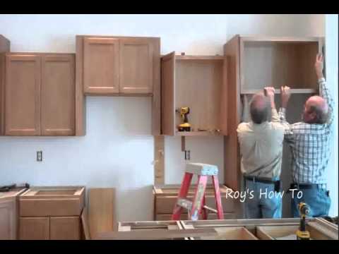 how to attach kitchen cabinets to a concrete wall