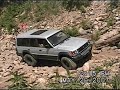 Mitsubishi Montero on rock sluice