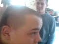 Reidy getting his hair shaved