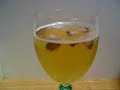 conical chocolates in a glass of beer