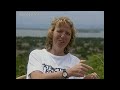 march 1996
debby cox has a dream. she wants to free a group of prisoners. incarcerated at entebbe zoo, uganda, there is a colony of orphan chimps. they charge around their wire-mesh cage, desperate for affection. their big hairy arms will embrace just about anything, including the camera! six hours drive away, an island sanctuary in queen elizabeth national park allows captive chimps to lead a semi-wild existence. an experiment to introduce a 3 month year old orphan into the group proves successful. debby and her zoo director hope to establish a similar sanctuary at entebbe. in the kigali reserve, harvard university professor, richard wrangham has spent twelve years crouching in the undergrowth, watching wild chimps in their natural environment. we hide in a clearing as two young males eat cautiously in front of the camera. but the chimp population is under threat from in-breeding. debby wants to solve the problem by gradually introducing her orphan chimps into the gene pool. significantly, 98% of those chimp genes are exactly the same as our own. if it is a crime to imprison innocent humans, surely the same applies to debby's 'chimp people'.
