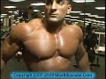 Bodybuilder Armon Adibi poses, trains pecs