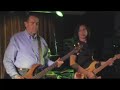 Mike Huckabee plays with Mama Kicks and Barry Goudreau