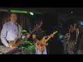 Mike Huckabee plays with Mama Kicks and Barry Goudreau