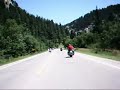 Deer Jumps Over Biker