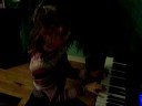 Kathryn Beri playing piano