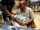 Daddy holding Baby Sam