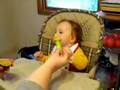 emma-feeding-herself