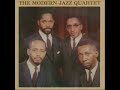 a nice piece of easy listening from the mjq. i think the line up may be percy heath (bass) connie kay (drums)
john lewis (piano) milt jackson (vibes)
please correct me if i'm wrong.