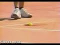 Fast serve ball splats onto the court