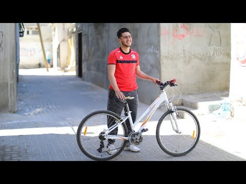 Injured Palestinian Runner Returns Home