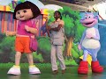 Dora the Explorer sings her theme song with boots at Kings Island Nickelodeon Universe