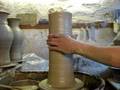 Throwing a big clay pottery vase on a potters wheel quickly demonstration demo how to pot throw