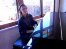 Spruce warms up the piano.
