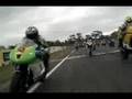 Motorcycle racer has close call - close call, crash, motorcycle, race