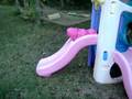 Adrianne head first down the slide