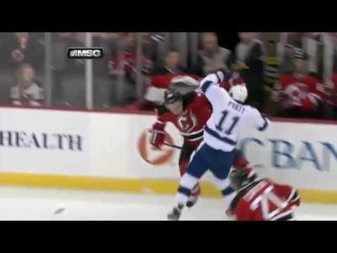 Tom Pyatt runs over Anton Volchenkov {Dual-Feed}