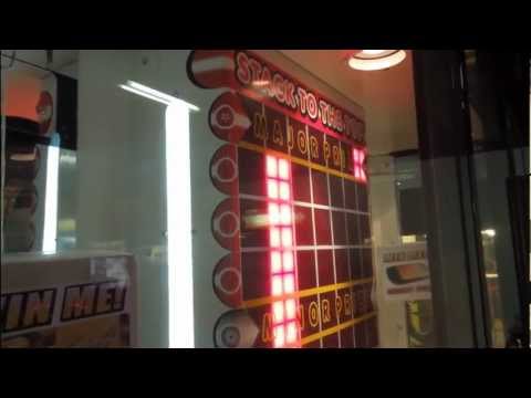 stacker - I try $10 on the HUGE stacker at Aces in the mall. This machine has prizes like a PSP, xbox 360. Lets see if I can snag one of em!