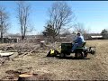 JD 318 pushing brush