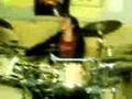Emppu kidding around with Heikki's drums!