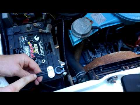 how to put a battery in a car