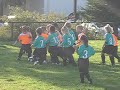 Alyssa playing soccer
