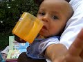 Jona Musoke drinking from cup