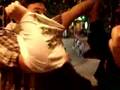 Friend trying to put on tank top