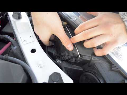 how to change a headlight bulb on a renault megane