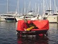 Climbing into a life raft