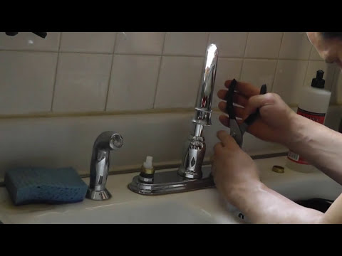 how to fix leak moen kitchen faucet