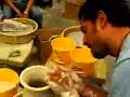 Mr. Santana of Laguna Creek High making a vase for a student.