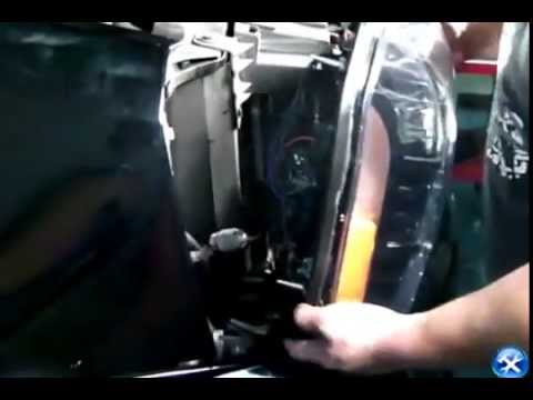 how to adjust headlights on 2007 gmc yukon