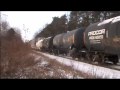 Freight Train Kicks Up Snow