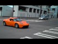 Orange Tesla Ridepast