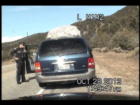 Police - In this video provided by the New Mexico Sate Police Department, officer Tony DeTavis attempts to stop Oriana Farrell, the minivan's driver, for a speeding v...